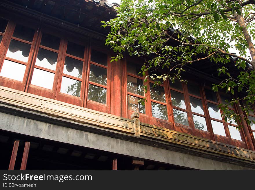 The view of the eave of an old special architecture.This picture is taken in Net lion wood in Suzhou ,China. The view of the eave of an old special architecture.This picture is taken in Net lion wood in Suzhou ,China.