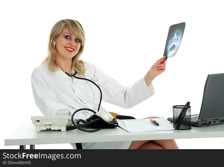 Young doctor with stethoscope on white background