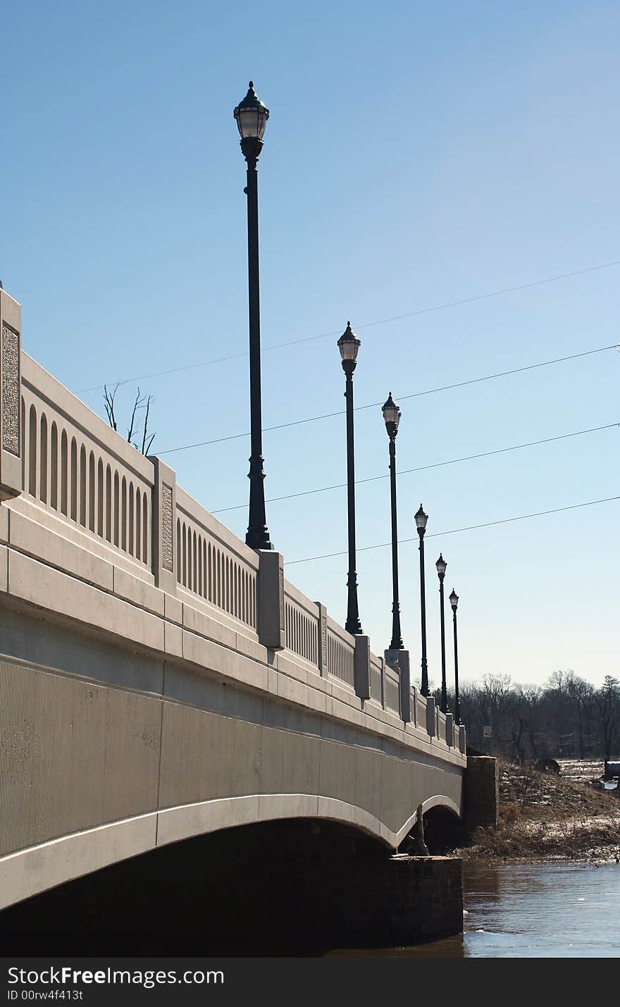 A Bridge lightposts over a river