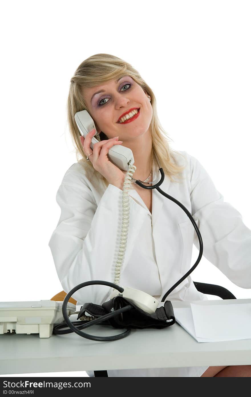 Young doctor with stethoscope on white background