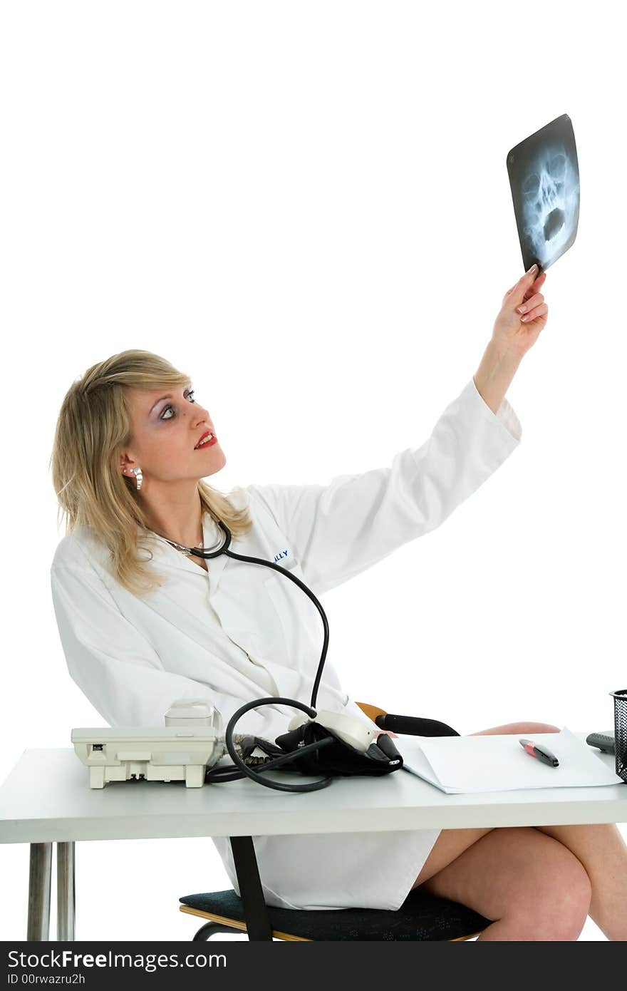 Young doctor with stethoscope on white background