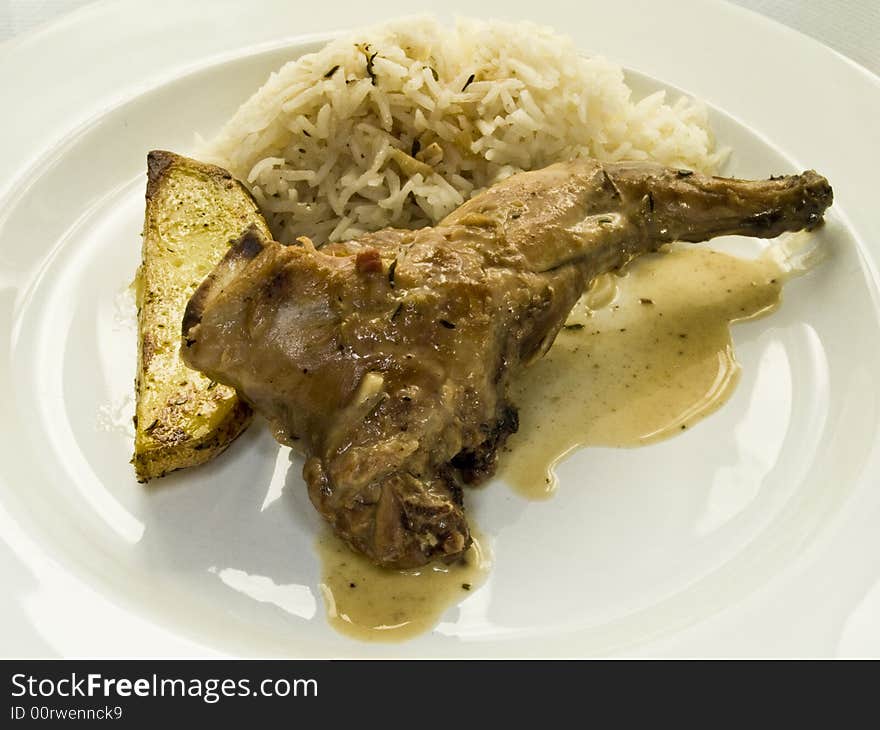 Leg of hare with rice and potato. Leg of hare with rice and potato