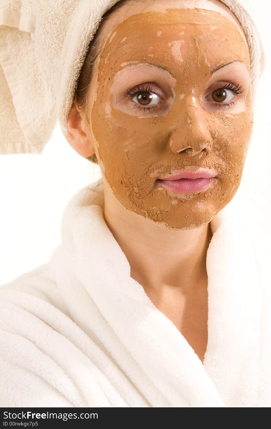 Beautiful woman wearing a skin mask. Beautiful woman wearing a skin mask