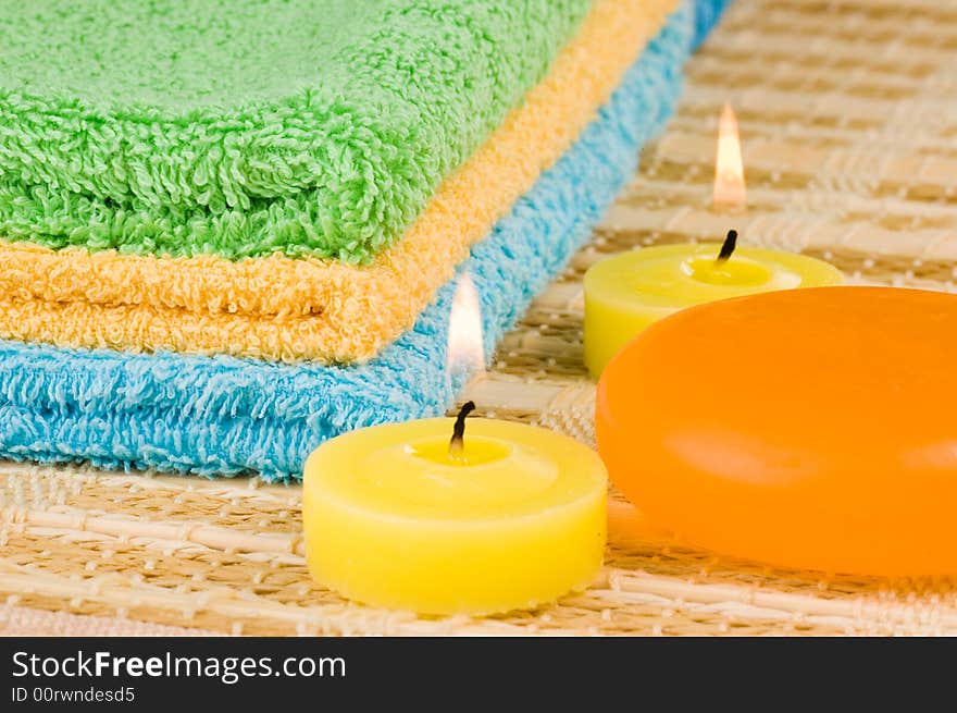 Towels Of Different Colors Soap And Candles