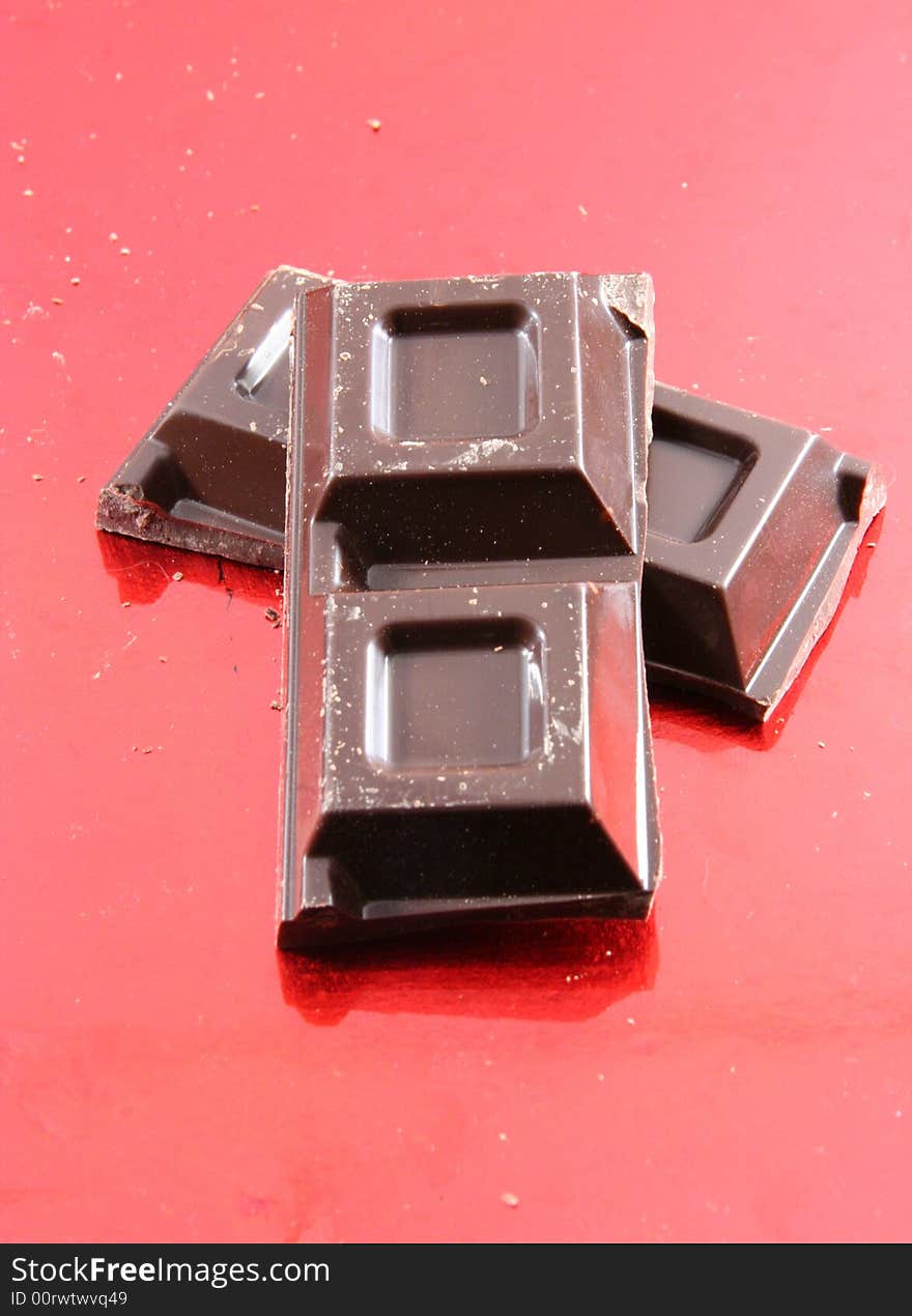 Chocolate isolated on a red background