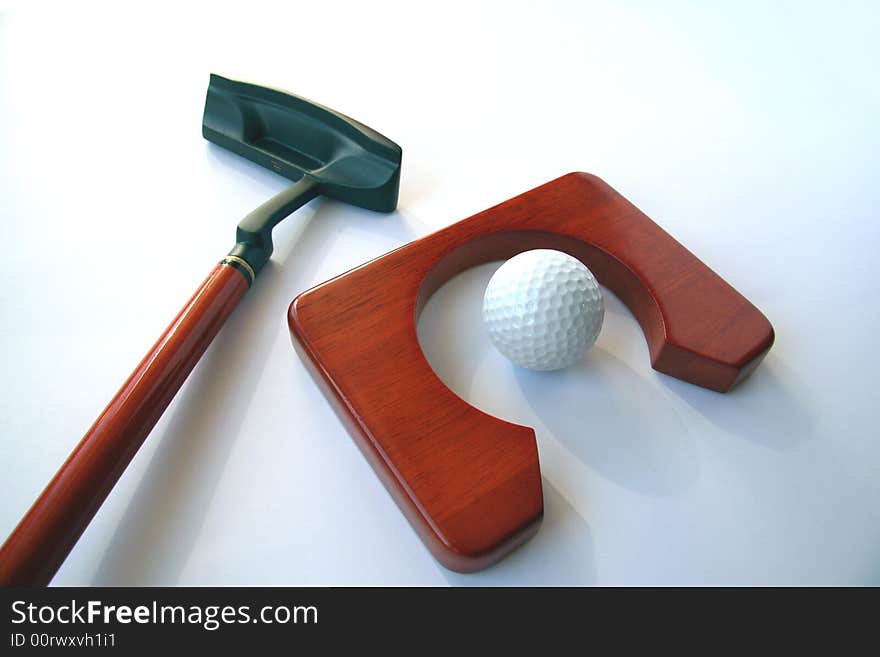 Golf club and a ball on white background. Golf club and a ball on white background.