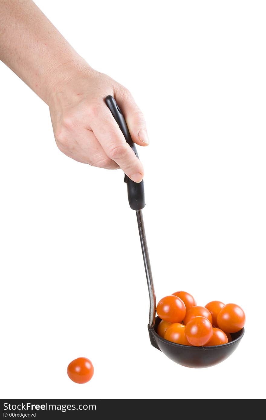 Hand with tomatoes isolated on a white background