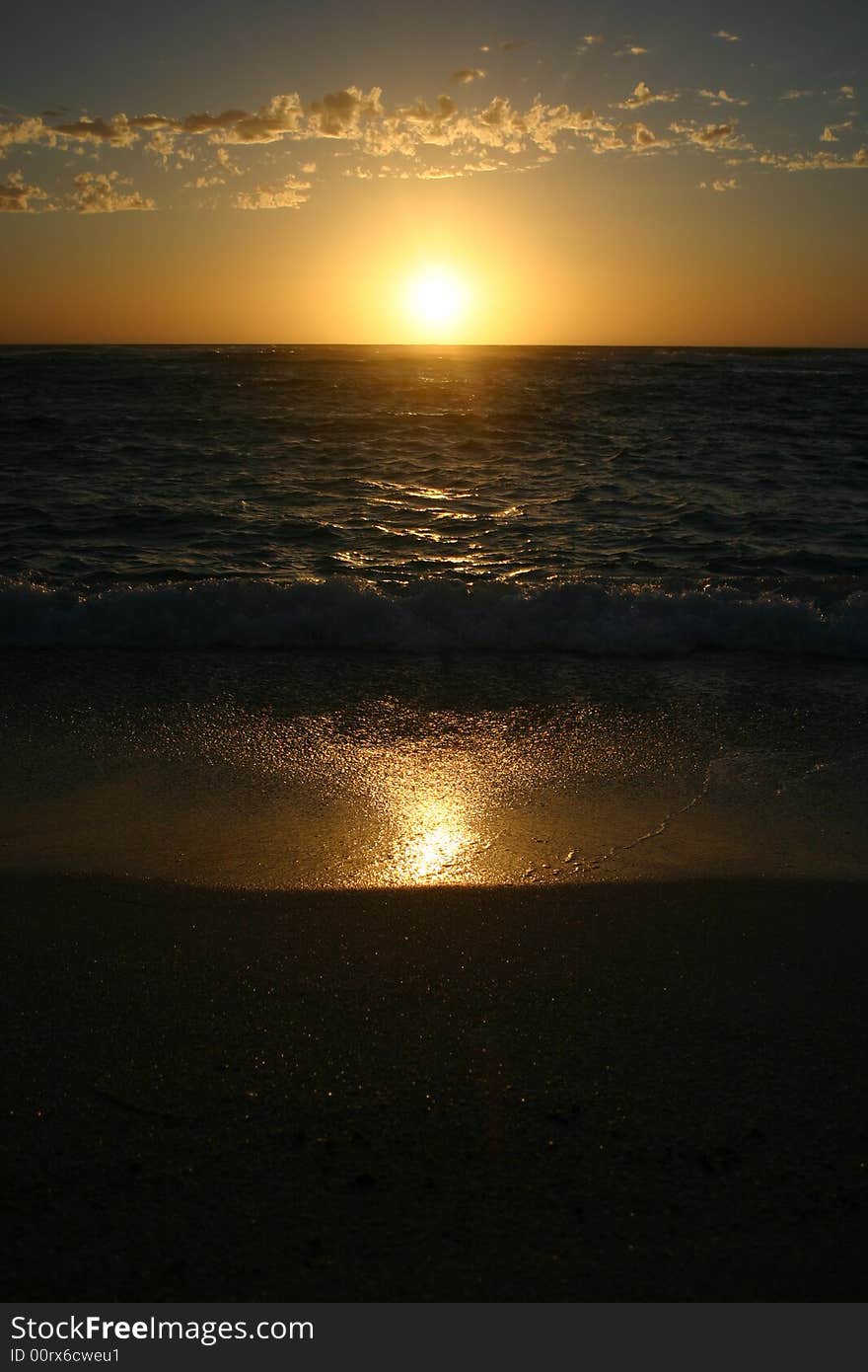 Beautiful sunset scene on a sandy beach. Australia.