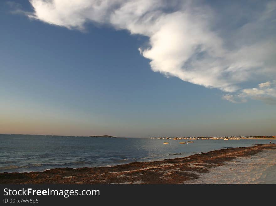 Sandy beach colored with late afternoon sunlight. Australia. Sandy beach colored with late afternoon sunlight. Australia.