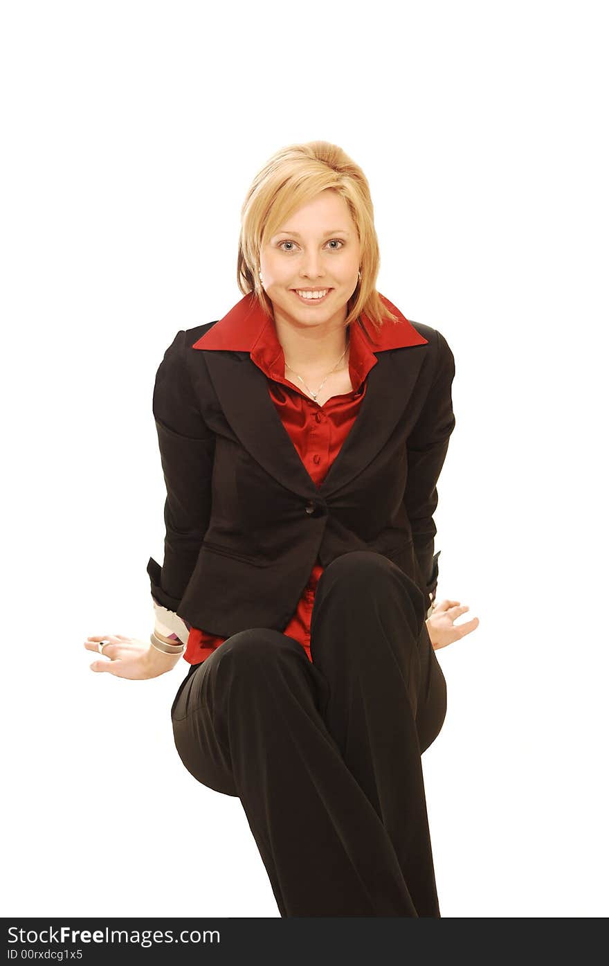 An friendly blond girl in an red blouse and black jacket sitting in an studio
for white background. An friendly blond girl in an red blouse and black jacket sitting in an studio
for white background.