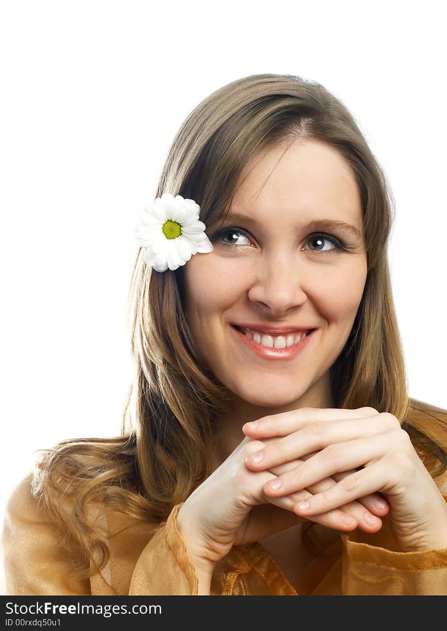 Smiling girl with daisy at hair on white background. Smiling girl with daisy at hair on white background