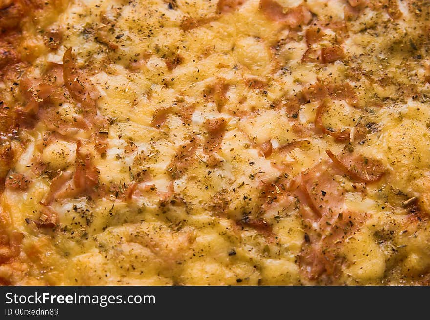 Fresh pizza with cheese and ham