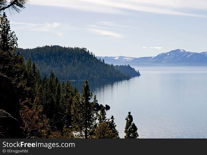 Foggy Lake Tahoe with clouds over it. Foggy Lake Tahoe with clouds over it