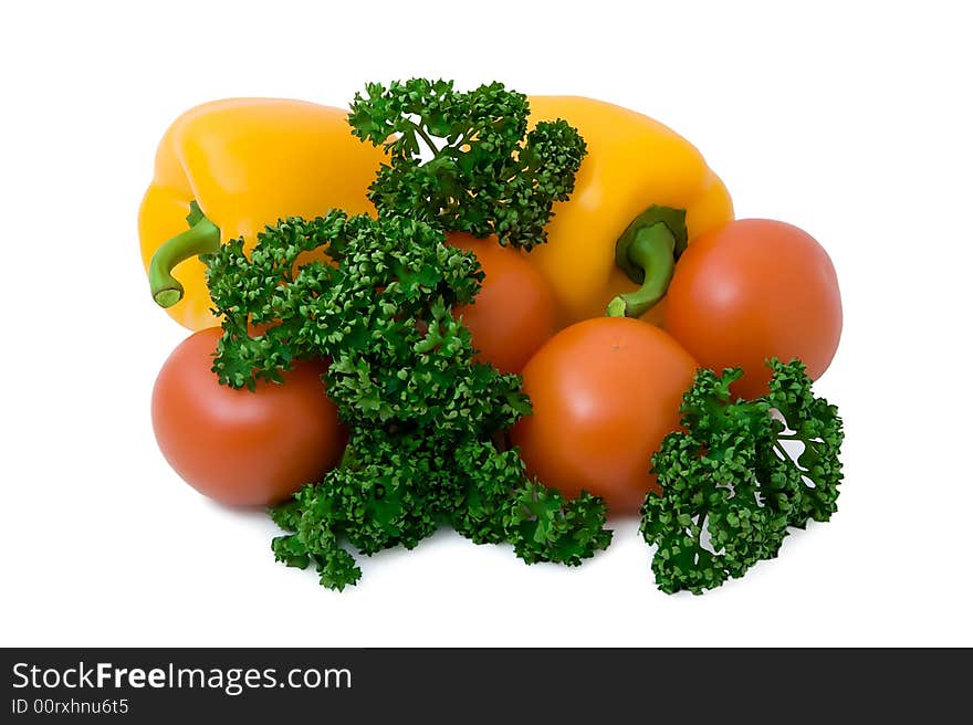 Isolated tomatoes pepper a parsley a close up. Isolated tomatoes pepper a parsley a close up