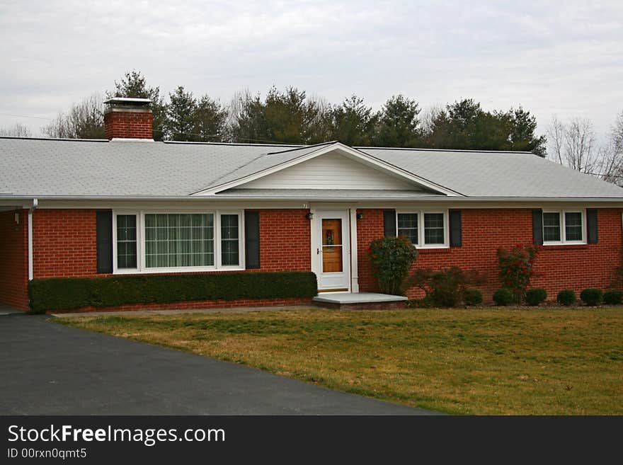 Red brick, single level home. Red brick, single level home.