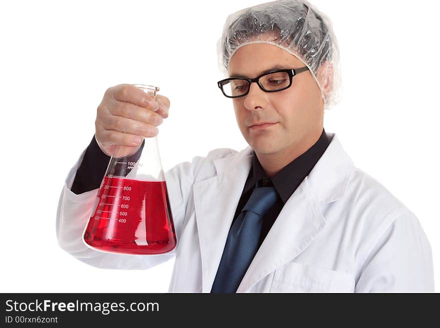 A chemist or laboratory worker holding a large flask of liquid. A chemist or laboratory worker holding a large flask of liquid.