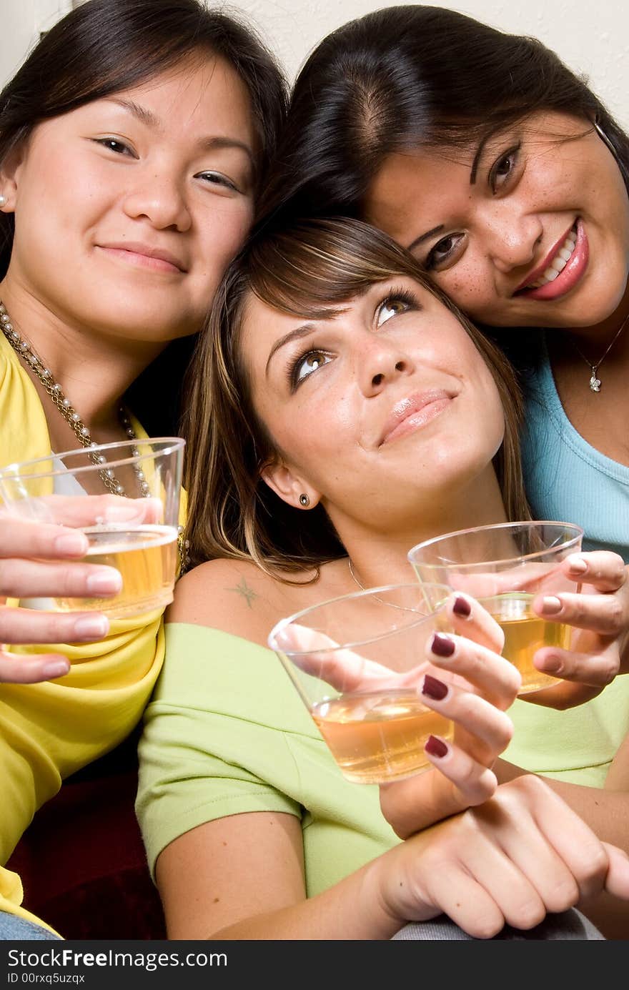 3 female friends enjoying a drink. 3 female friends enjoying a drink.