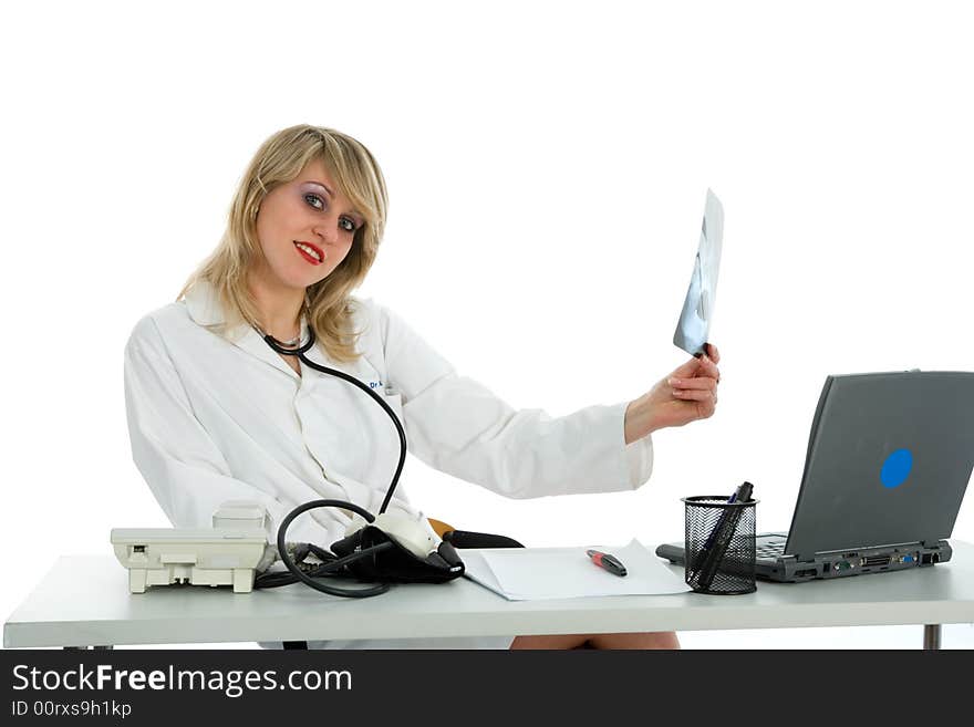 Young doctor with stethoscope on white background