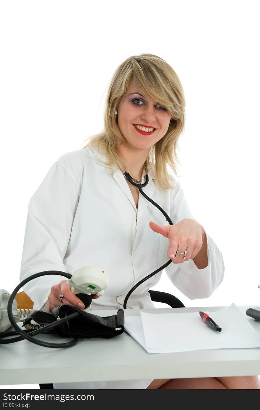 Young doctor with stethoscope on white background