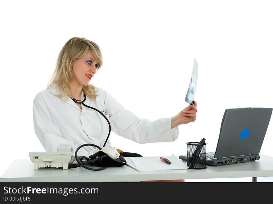 Young doctor with stethoscope on white background