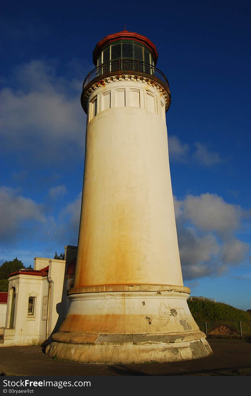 Lighthouse standing tall basking in the sunlight