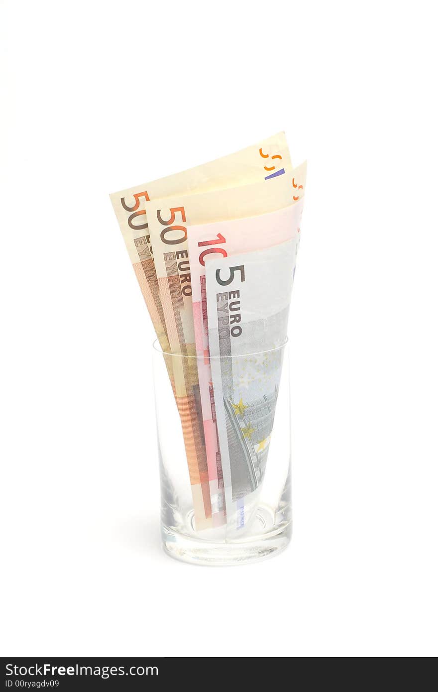 Euro banknotes in a glass. Euro banknotes in a glass