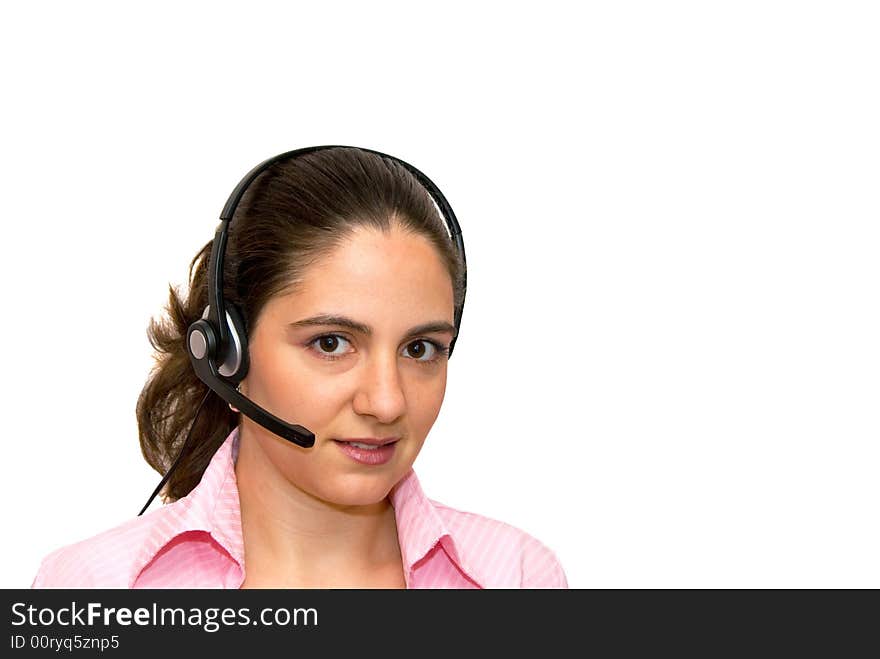 A girl wearing headphones, listening and smiling, looking at the camera. A girl wearing headphones, listening and smiling, looking at the camera