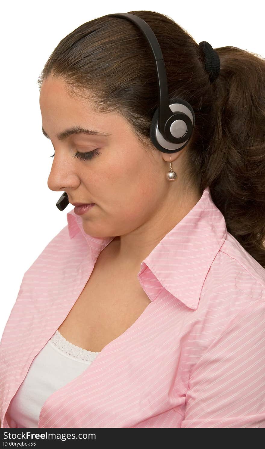 A girl, wearing headphones, very concentrated listening. A girl, wearing headphones, very concentrated listening