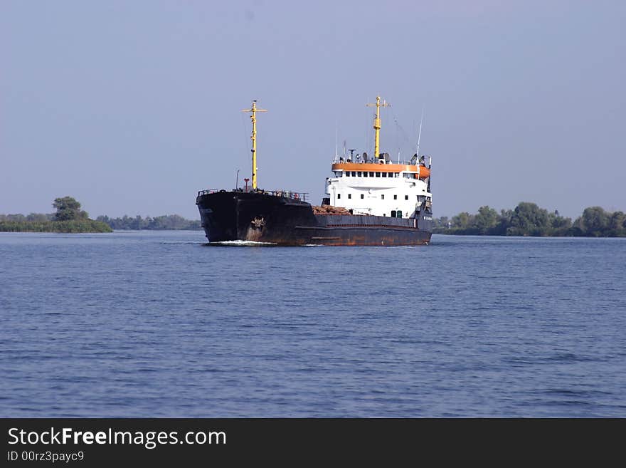 Industrial ship coming into port. Industrial ship coming into port.