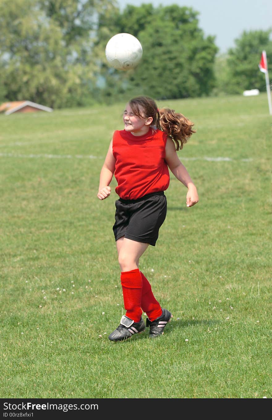 Teen Youth Soccer Playing Ball Off Head