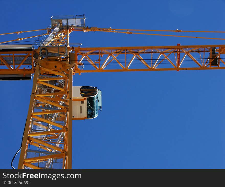 A dynamic angle looking at the bottom side of a crane. A dynamic angle looking at the bottom side of a crane.