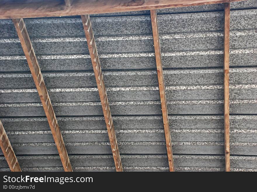 Tin roof texture with wooden slats