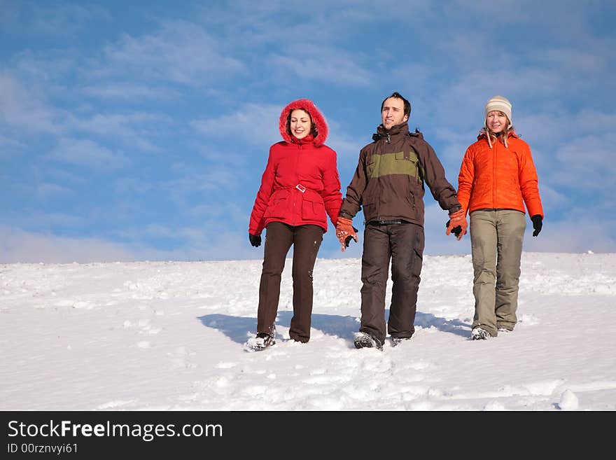 Three friends walk on snow 2