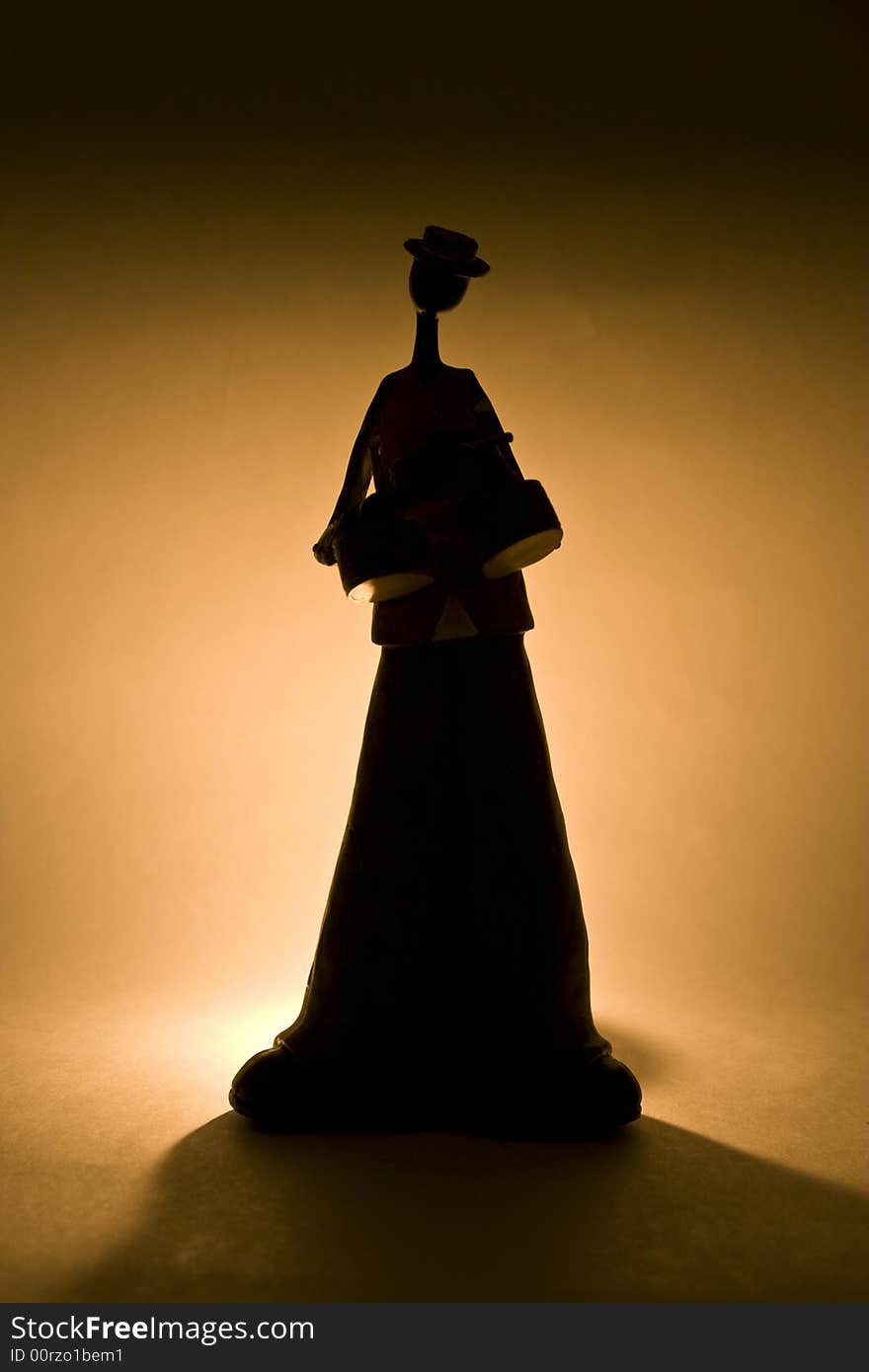 Silhouette of a Drummer Man Statue