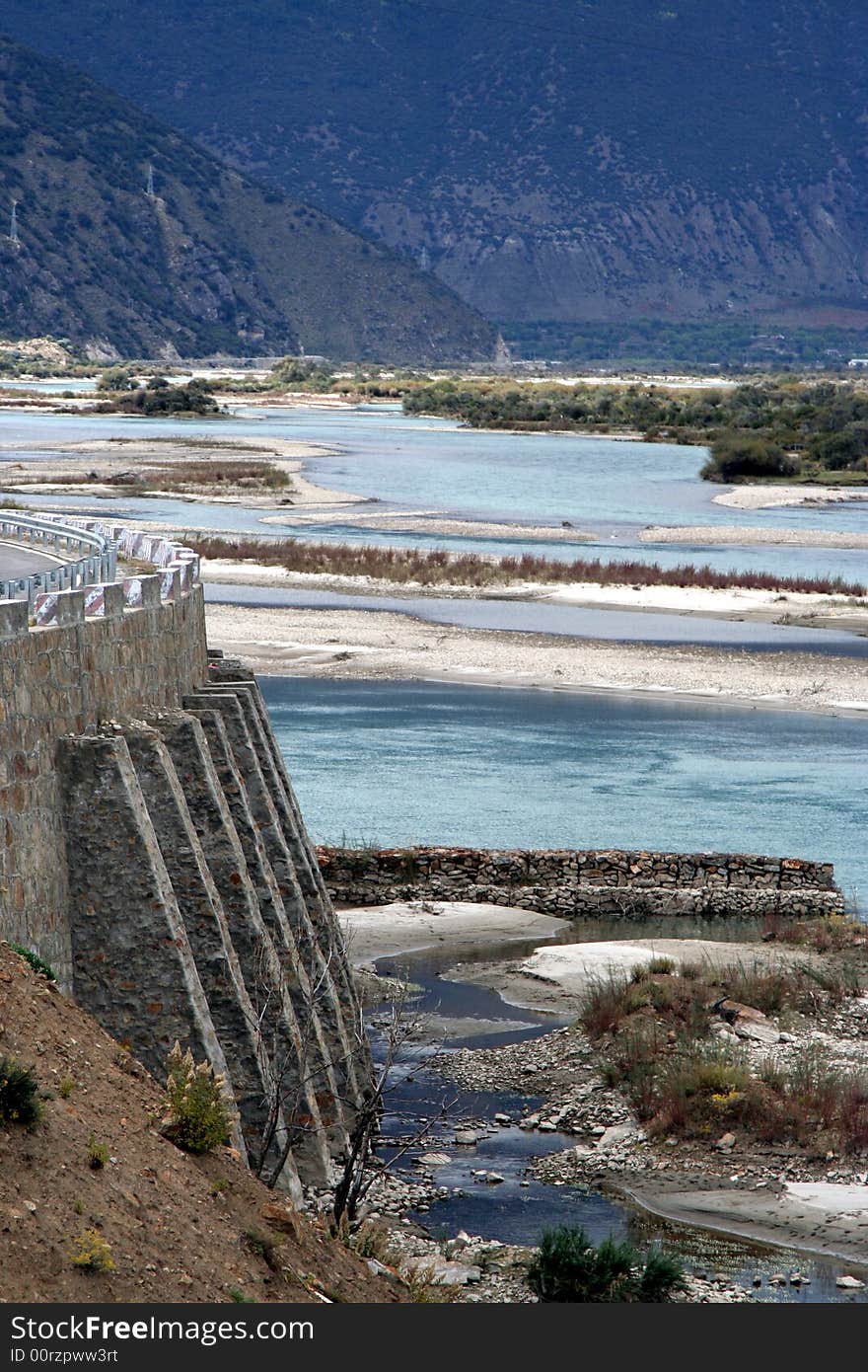 Roadbed like a castel by the riverside, water architecture，dam，valley