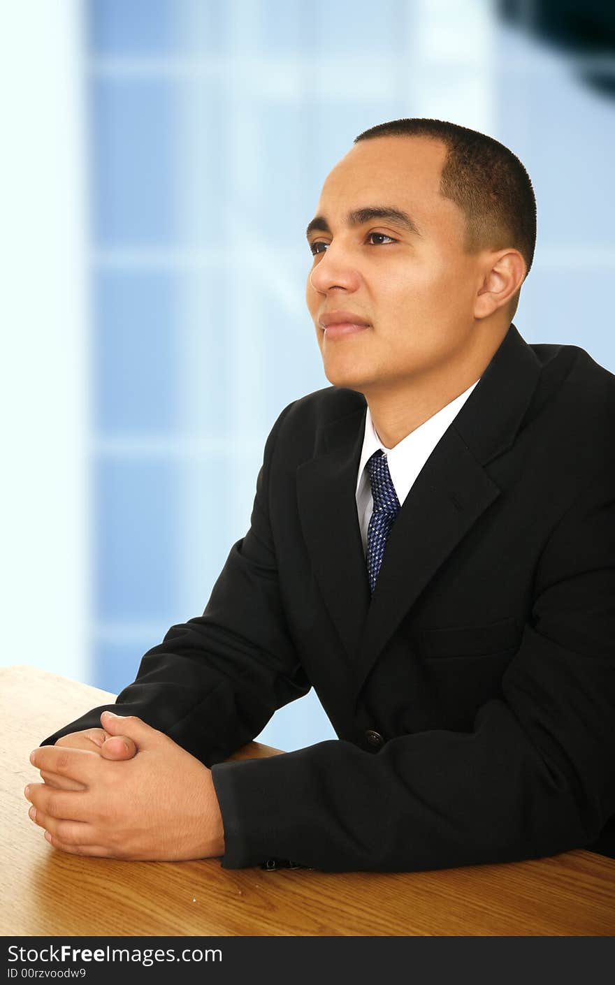 Business man listening to lecture for meeting or seminar in contemporary office environment. Business man listening to lecture for meeting or seminar in contemporary office environment