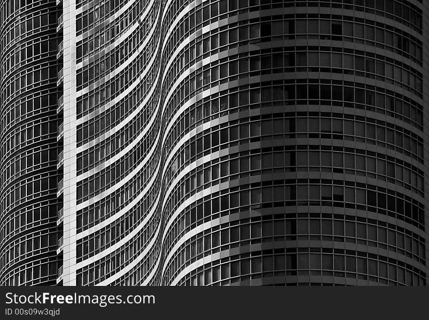 Windows on a building creating a curvy pattern. Windows on a building creating a curvy pattern