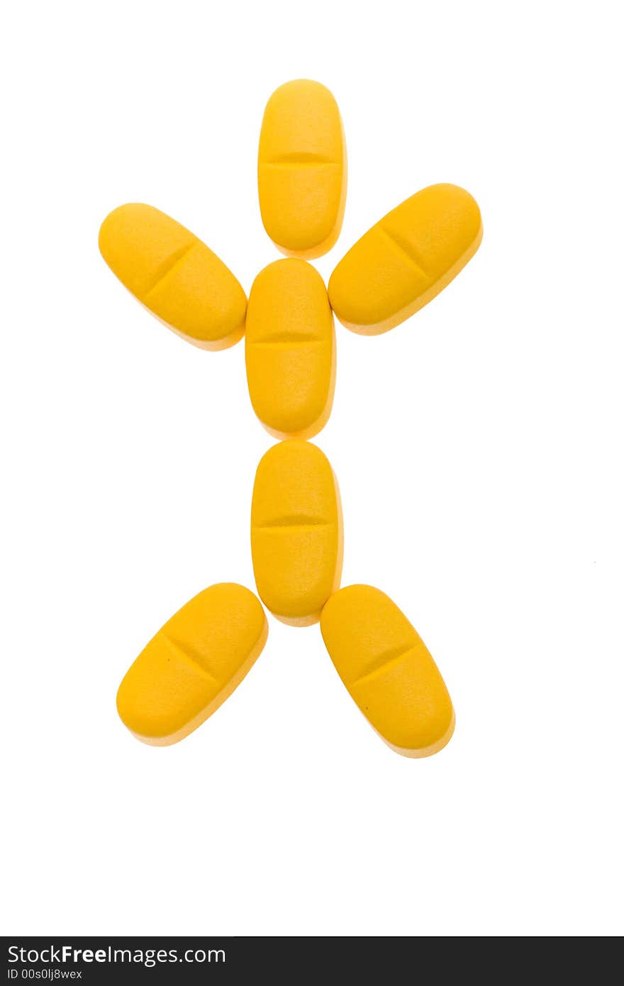 Man silhouette made from orange pills. Symbol of recovery. Isolated on white