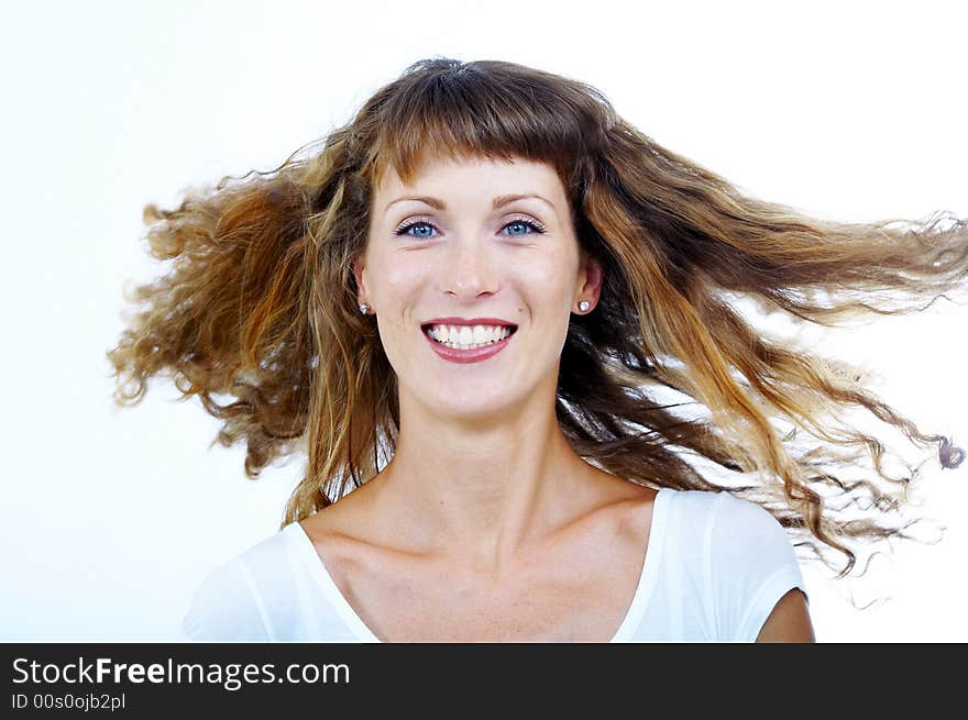 Stylish shot of nice young long hair woman on white back. Stylish shot of nice young long hair woman on white back