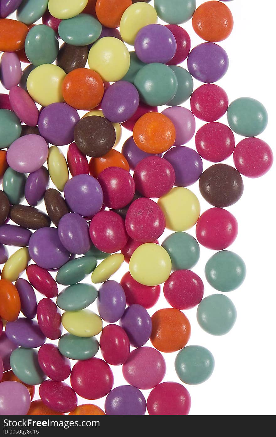 Multicoloured Sweets against a white background