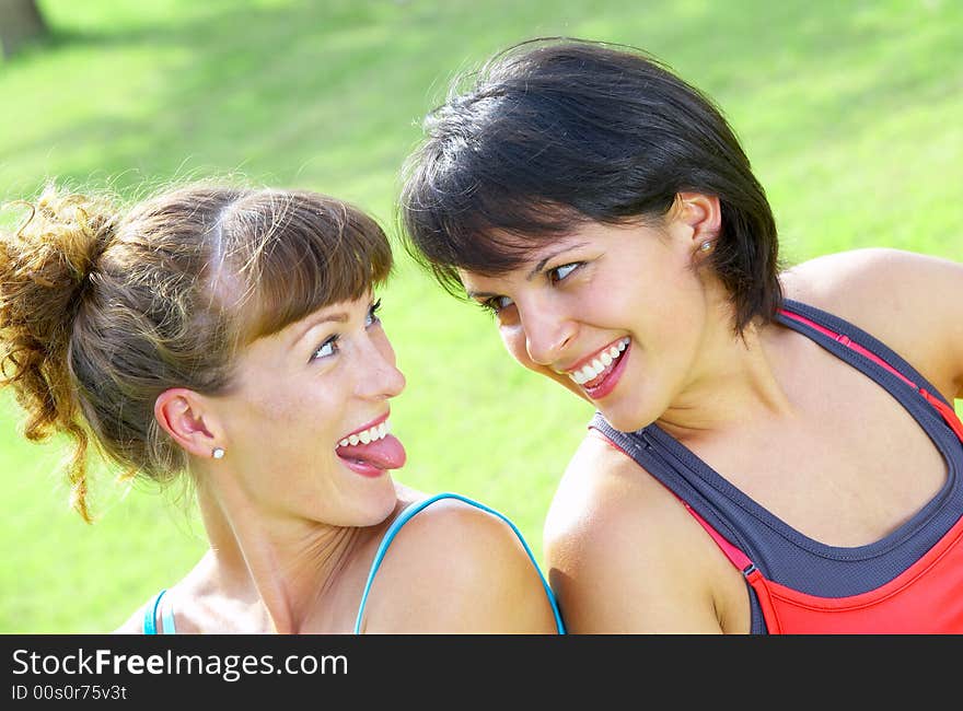 Portrait of two young woman having fun in summer environment. Portrait of two young woman having fun in summer environment