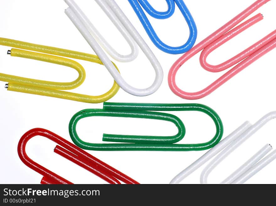 Close-up of colored paperclips isolared on white background. Close-up of colored paperclips isolared on white background