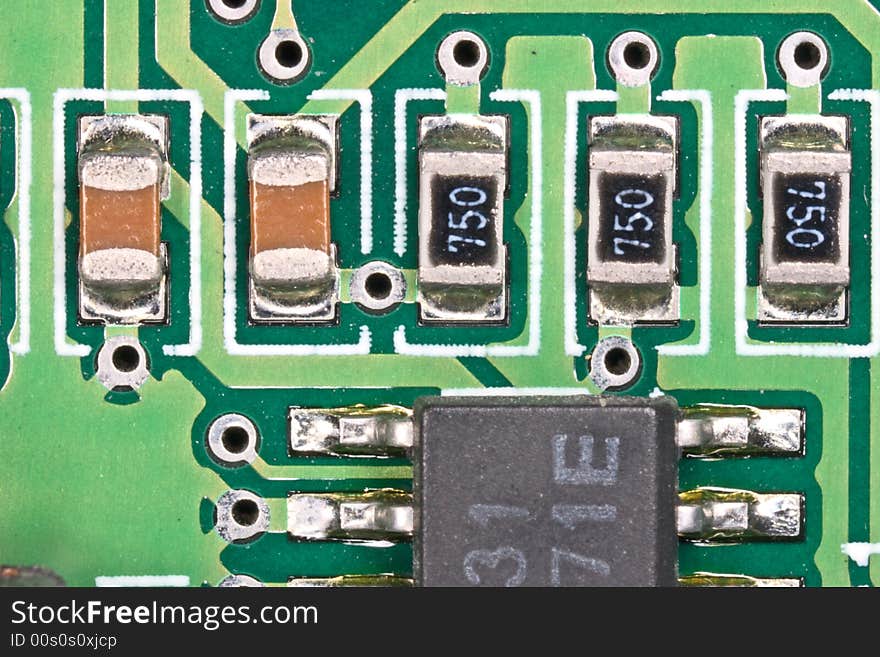 Extreme close-up of a computer cicuit board. Extreme close-up of a computer cicuit board