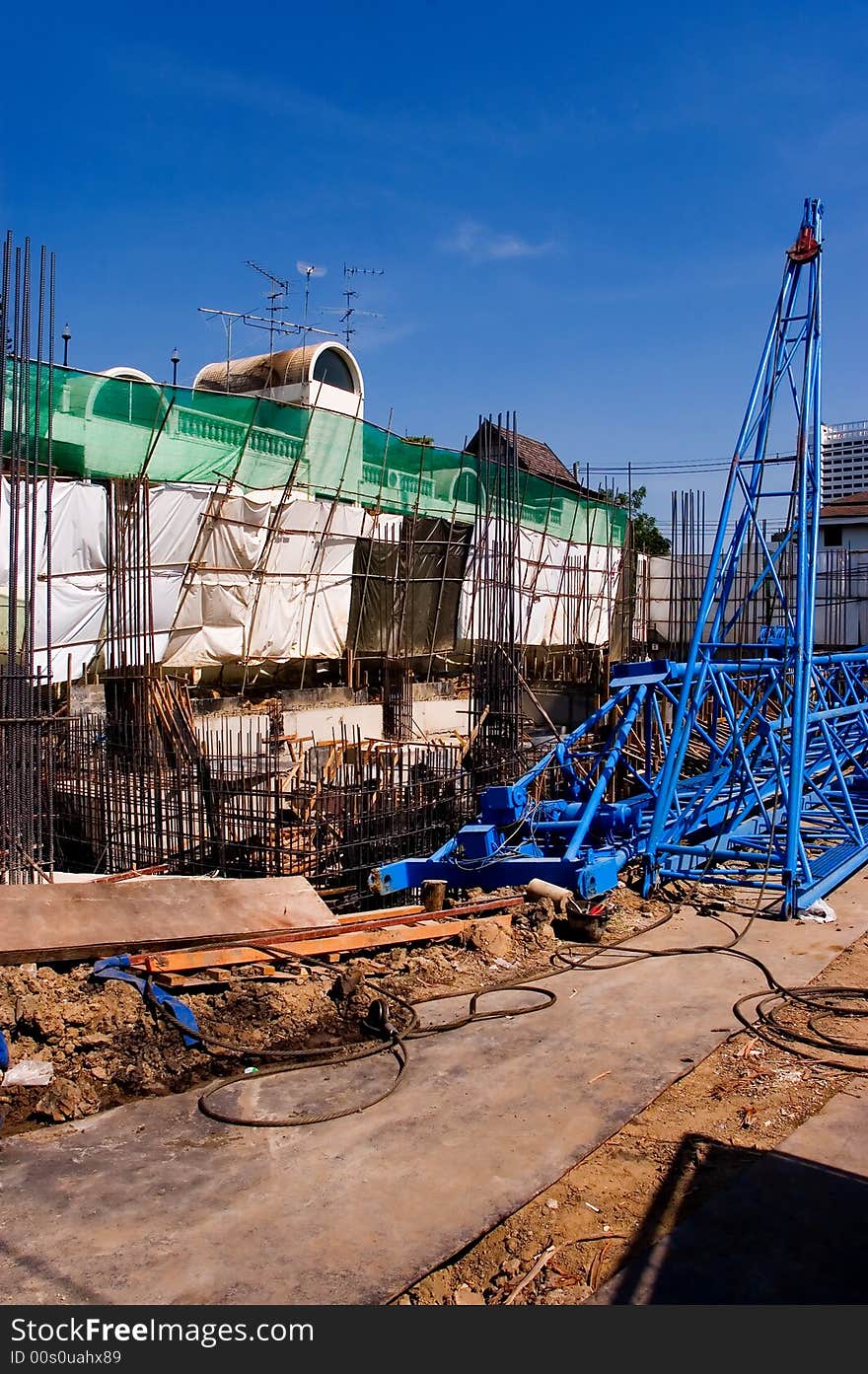 Messy looking construction yard building a house