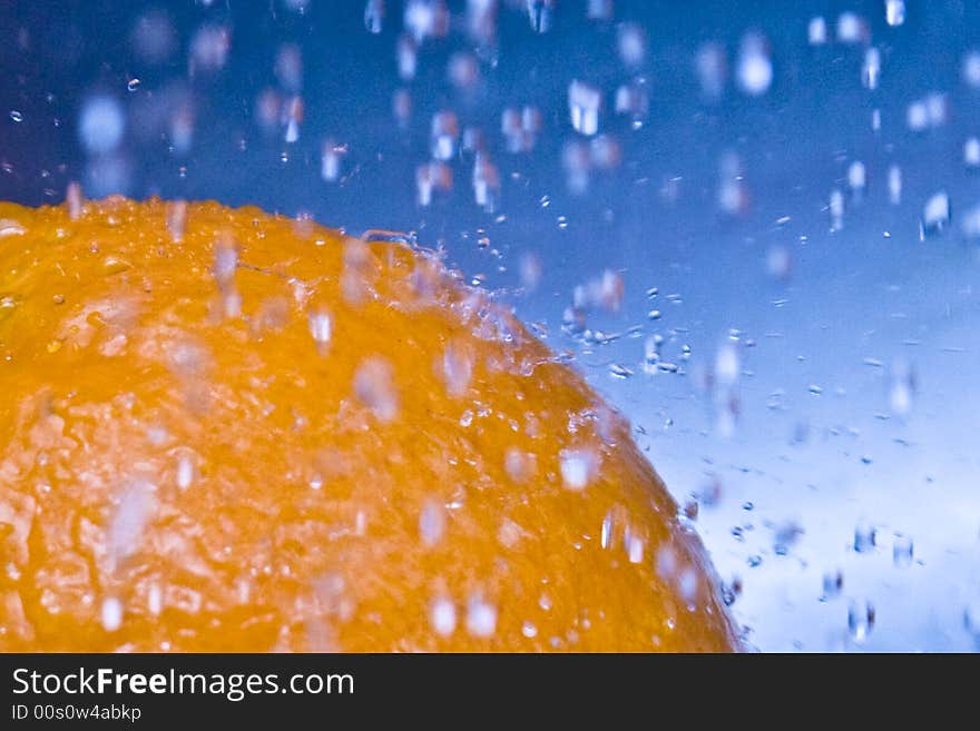 Water Drops bouncing of an Orange. Water Drops bouncing of an Orange