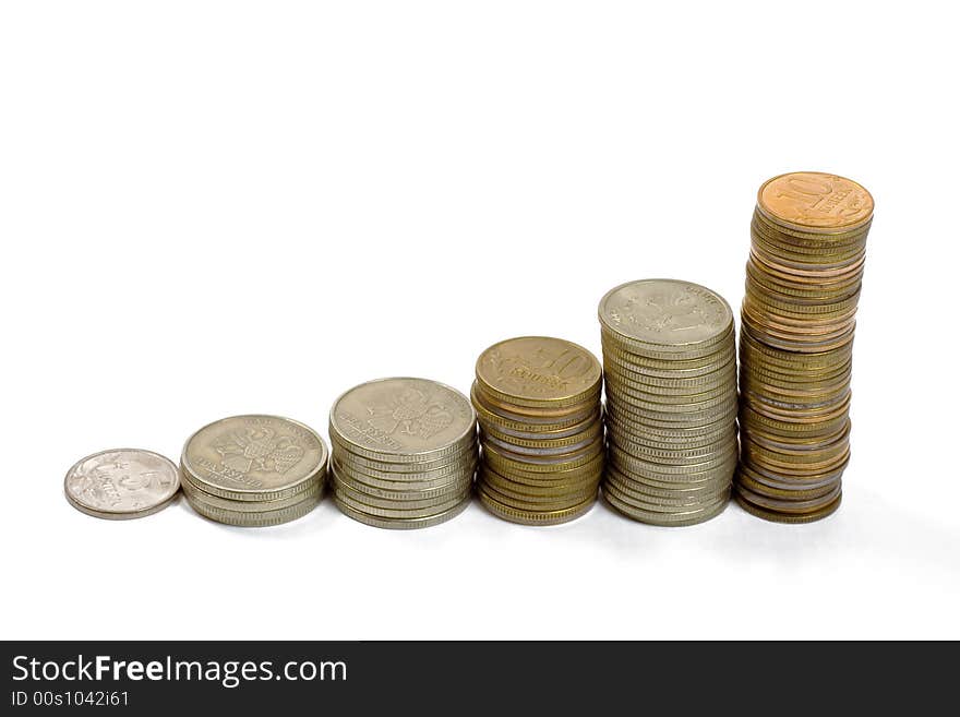 Raising stack of coins. Concept of  a growing chart. Isolated on white. Raising stack of coins. Concept of  a growing chart. Isolated on white