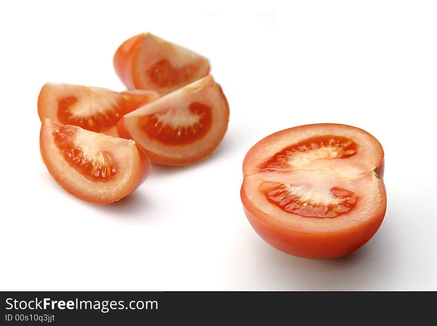 Cut tomato on white