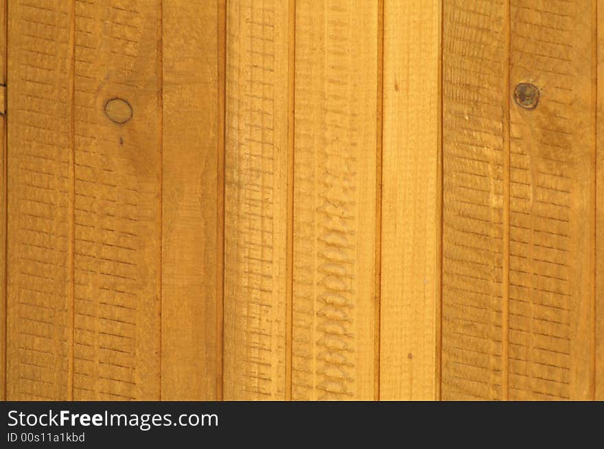 A photo of wooden wall of some suburban house or a shed.