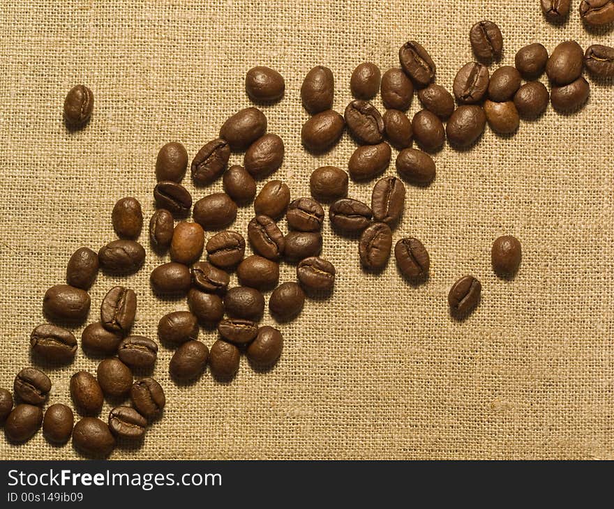 Group of coffee grain on burlap. Group of coffee grain on burlap