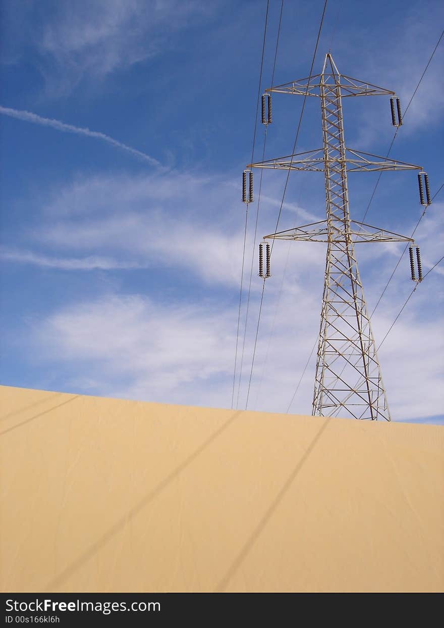 Power lines and sand dunes. Power lines and sand dunes